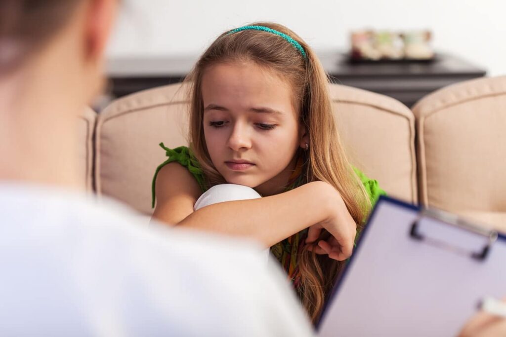 a child looks sad during depression treatment for children