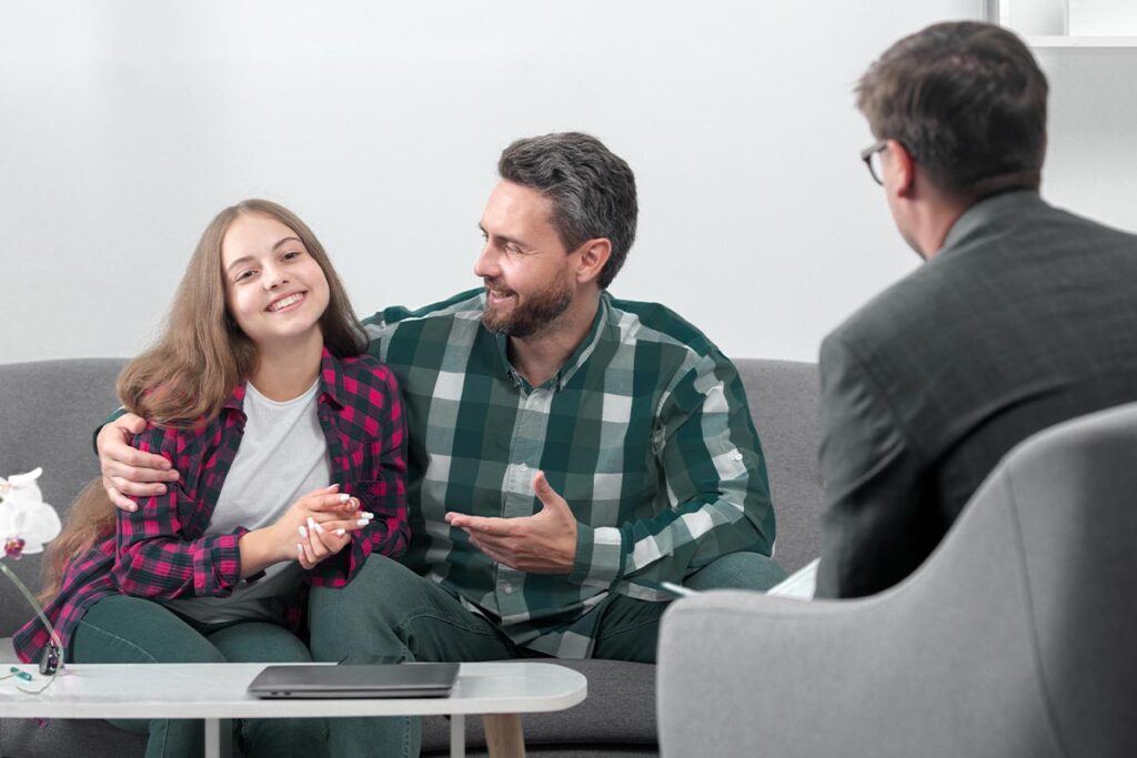 a family talking to a doctor about humana insurance for mental health