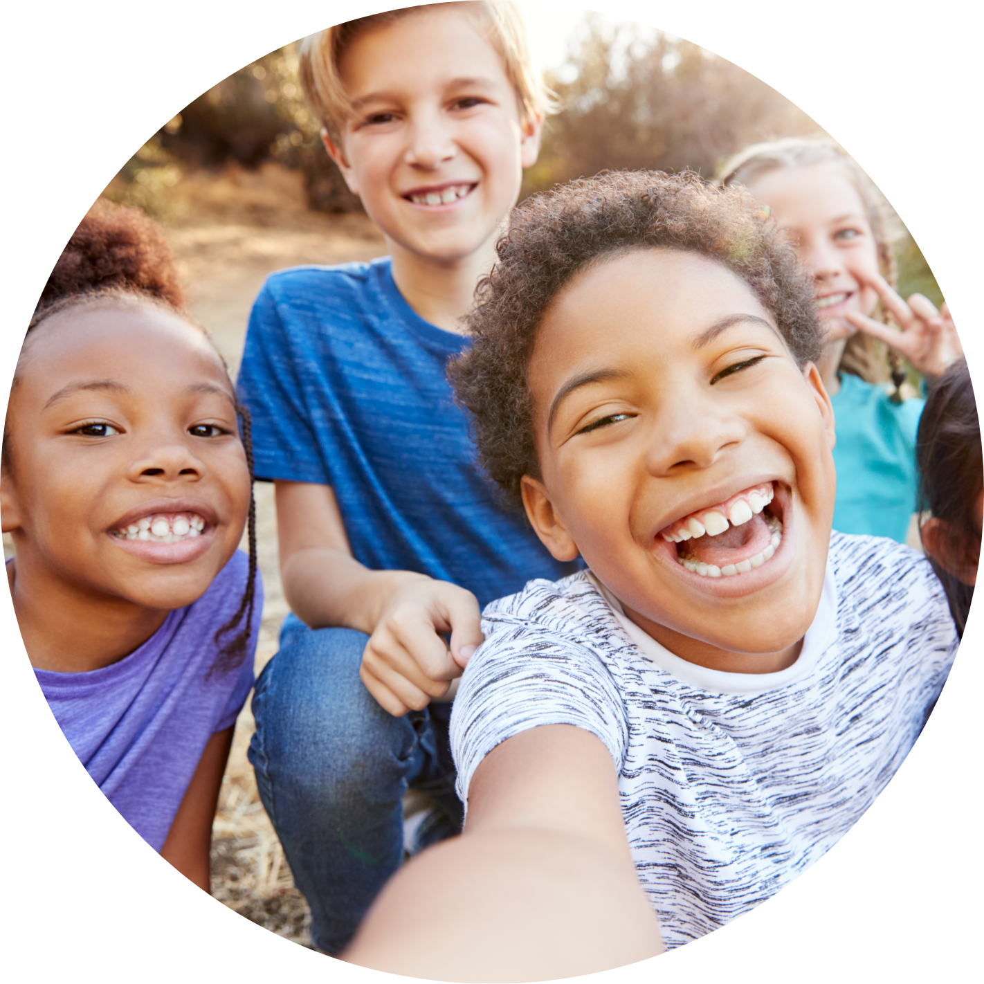 Kids smiling in a group