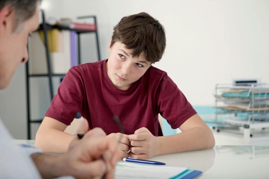 a therapist explains the iop meaning to a teen